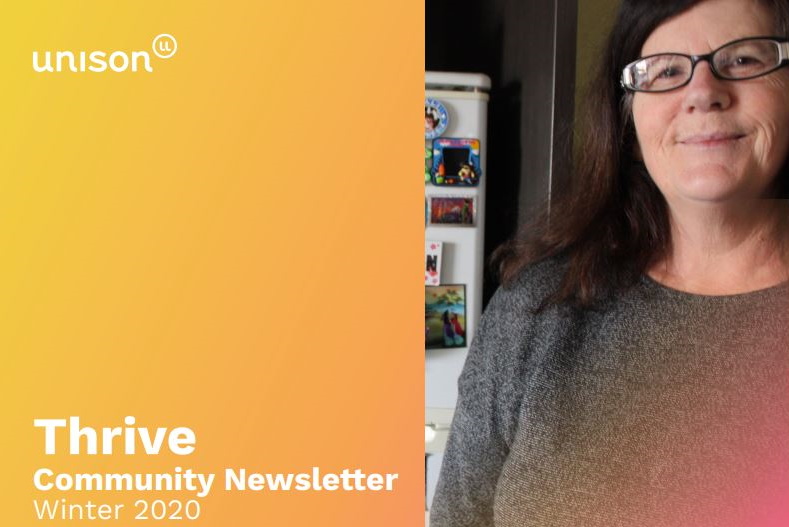 A woman wearing glasses and a gray sweater stands indoors, smiling. The left side of the image has a yellow-orange gradient background with the text unison, Thrive Community Newsletter, and Winter 2020.